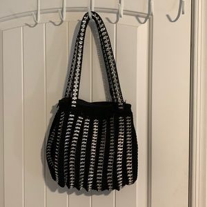 Hand Made in Mexico. Purchased in Juarez Mexico. Made with bottle tops. Quality!